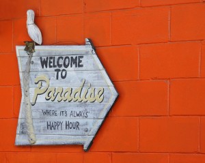 Welcome to Paradise sign at Crab Shack